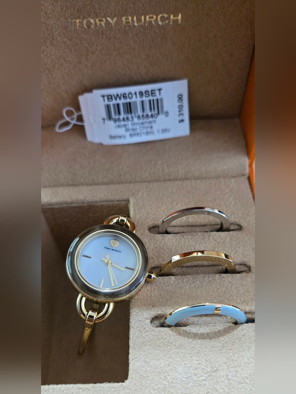 Tory Burch Gold Tone Interchangeable Bangle Watch with White Dial Accents